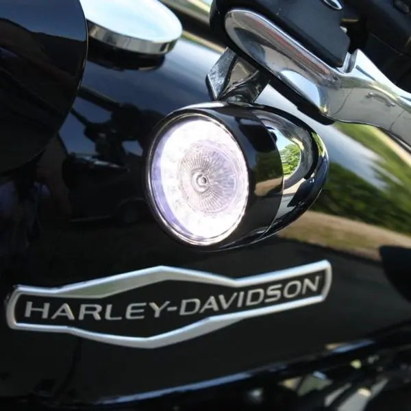 A close up of the harley davidson logo on a motorcycle.
