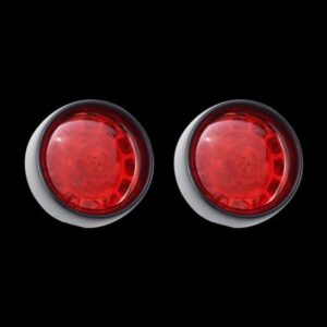 A pair of red lights on a black background