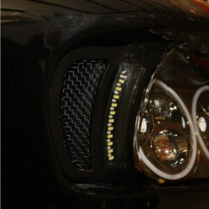 A close up of the headlight on a car