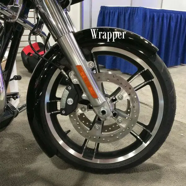 A close up of the front wheel on a motorcycle.