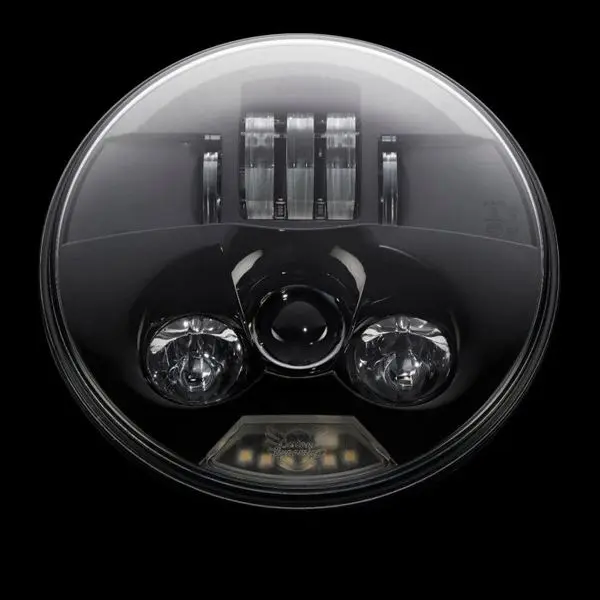 A close up of the front view of a car headlight.