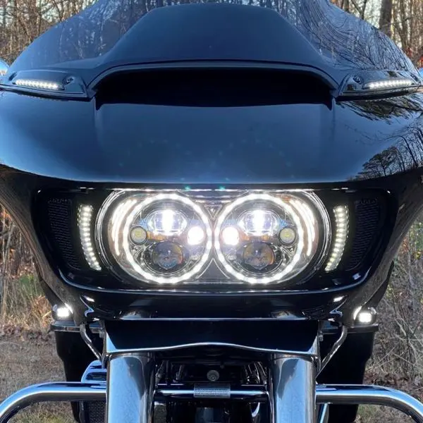 A close up of the front lights on a motorcycle