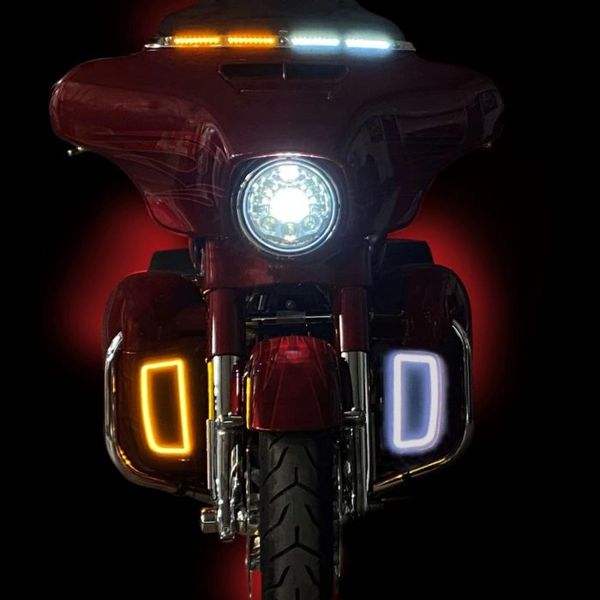 A motorcycle with lights on the front of it.