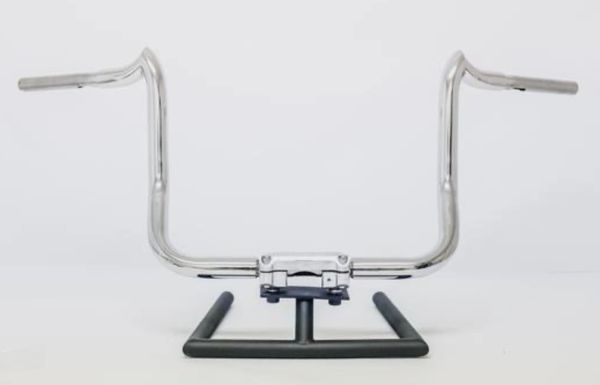 A chrome motorcycle handlebar with two bars on the end.