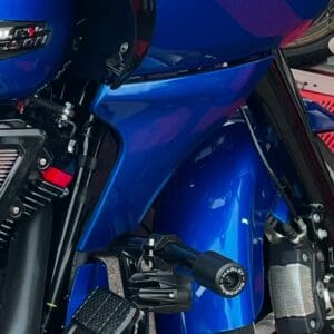 Blue motorcycle with detailed front view.